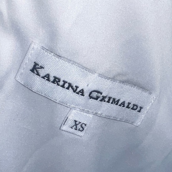 Karina Grimaldi White 100% linen One Piece
Romper with Spaghetti Straps - Picture 7 of 10